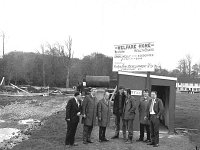 Erskine Childers in Westport, May 1973. - Lyons0014818.jpg  Erskine Childers in Westport, May 1973.  President of Ireland Erskine Childers visiting the site for the new Welfare Home in Westport, now the McBride Home.  L-R: Michael Browne, Solicitor for Westport UDC; Denis Gallagher TD, Curraun; President Childers; Peter Mullen, carpenter with Padraic Conlon, Conlon Construction, Westport; Sean Staunton, Westport UDC and Paddy Muldoon, Mayo County Council. : 1973 Misc, 19730509 Erskine Childers in Westport 7.tif, Lyons collection, Westport