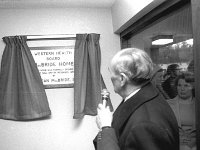 Opening of the Mc Bride Home in St Mary's Crescent Westport, December 1974 - Lyons0014892.jpg  Opening of the Mc Bride Home in St Mary's Crescent Westport, December 1974 and mass afterwards in St Mary's Church. Sean Mc Bride unveiling the plaque to his late father in the Mc Bride Home. : 19741230 Opening of the Mc Bride Home 1.tif, Lyons collection, Westport