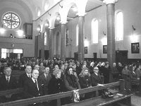 Opening of the Mc Bride Home in St Mary's Crescent Westport, December 1974 - Lyons0014901.jpg  Opening of the Mc Bride Home in St Mary's Crescent Westport, December 1974and mass afterwards in St Mary's Church. In the front row at the special mass for the opening. At left Sean Mc Bride son of Major Sean Mc Bride and other close relations. : 19741230 Opening of the Mc Bride Home 11.tif, Lyons collection, Westport