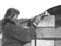 Mary Doutwaithe building her house. Westport, April 1976. - Lyons0014934.jpg  Mrs Mary Doutwaithe building her house. Westport, April 1976. : 19760419 Building her house 1.tif, Irish Independent, Lyons collection, Westport