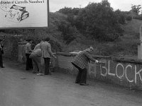 Graffitti in Westport, July 1978.. - Lyons0015035.jpg  Painting out the H block graffitti on Altamont St. Graffitti in Westport, July 1978. : 1978 Misc, 19780727 Graffitti in Westport 1.tif, Lyons collection, Westport