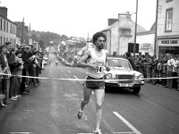 Road Race in Westport Festival, August 1980. - Lyons0015131.jpg  First man home on the finishing line on the top of James St. The first annual road race in Westport weekend festival. August 1980. : 19800809 Road Race in Westport Festival 6.tif, Lyons collection, Westport