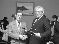 Peter Flanagan presenting baton to Mike Roberts,November, 1983. - Lyons0015196.jpg  Peter Flanagan presenting baton to Mike Roberts Musical Director of Westport Town Band. November 1983. : 19831119 Westport Town Band 1.tif, Lyons collection, Westport