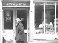 Mc Gings' shop and pub, Westport, April 1984 - Lyons0015227.jpg  View of Bridge St and Mc Gings' shop and pub, Westport, March 1984. Now Matt Molloy's pub. Matt Molloy's pub opened in 1989. : 19840403 Mc Ging's shop 5.tif, Lyons collection, Westport
