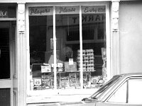 Mc Gings' shop and pub, Westport, April 1984 - Lyons0015229.jpg  View of Bridge St and Mc Gings' shop and pub, Westport, March 1984. Now Matt Molloy's pub. Matt Molloy's pub opened in 1989. : 19840403 Mc Ging's shop 7.tif, Lyons collection, Westport