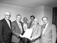 John Fergus on the occasion of his retirement from Bord Telecom, Westport, November, 1985. - Lyons0015300.jpg  Second from the left, John Fergus on the occasion of his retirement from Bord Telecom at a presentation ceremony with his colleauges in the Ryan Hotel Westport. November 1985. : 19851101 Retirement from Bord Telecom.tif, Lyons collection, Westport