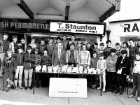 Martin Keane and the youth club receiving trophies from West Coast Shoes, Westport. March, 1987. - Lyons0015407.jpg  Martin Keane and the youth club receiving trophies from West Coast Shoes (50 years making shoes in Westport). March 1987. : 19870314 Presentation of trophies.tif, Lyons collection, Westport