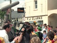 Pre Horseshow parade, Westport, May 1987. - Lyons0015425.jpg  Pre Horseshow parade, Westport, May 1987. RTE filming the parade. RTE producer Justin Nelson wearing sun glasses. : 19870528 Pre Show Parade 9.tif, Lyons collection, Westport