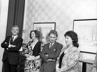 Art exhibition in the Bank of Ireland Westport 1989. - Lyons0015569.jpg  Art exhibition in the Bank of Ireland Westport. L-R : Sean Staunton Chairman Westport UDC; Dr Patricia Noone who opened the exhibition, artist John McNulty and a guest. August 1989. : 19890803 Art Exhibition.tif, Lyons collection, Westport