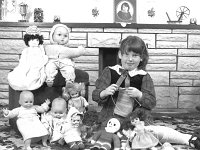 Finnegans Westport , October 1989.. - Lyons0015580.jpg  Sinead Finnegan with a collection of dolls and knitted clothes. Sinead learning to knit.  Westport, October 1989 : 19891015 Finnegans Westport 4.tif, Farmers Journal, Lyons collection, Westport