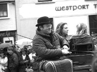 St. Patricks day parade, Westport, March 1990. - Lyons0015647.jpg  St. Patricks day parade, Westport, March 1990. Paddy Joe Foy with happy passengers on his side car at St. Patricks day parade. : 19900317 St Patrick's Day 14.tif, Lyons collection, Westport