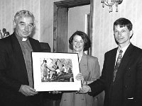 Presentations to Fr Tony King ADM Westport, July 1993, - Lyons0015841.jpg  Presentations to Fr Tony King ADM Westport, July 1993,   on the occasion of his appointment to Athenry parish. Michael O'Donnell and Mary Angela Kelly from the Aror committee presenting a picture from an Aror scene to Fr Tony. : 19930714 Presentations to Fr Tony King.tif, Lyons collection, Westport