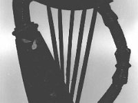 Satch Kiely's Antques, Westport, June 1996.. - Lyons0015957.jpg  Satch Kiely's Antques, Westport, June 1996.  Black bog oak atricles in Satch Kiely's Antique Shop. Harp carved from black oak. : 19960614 Satch Kiely's Antques 3.tif, Lyons collection, Westport