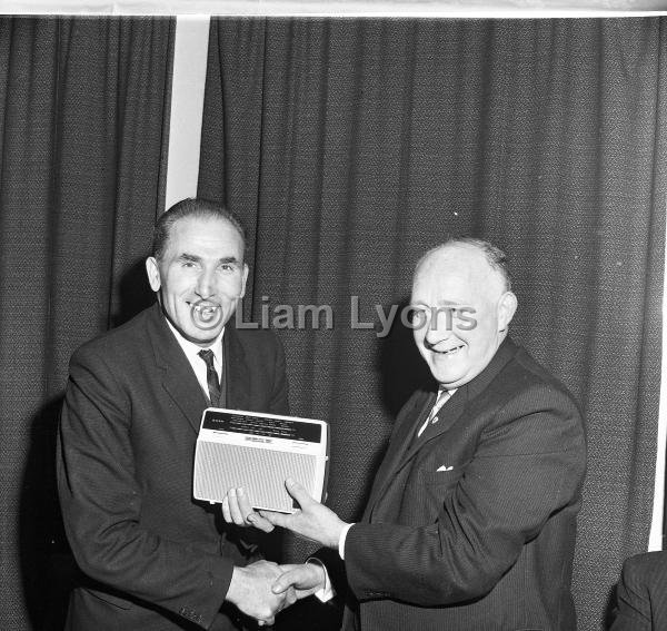 Presentation to Jack Kenny by Noel McNamara, 1964