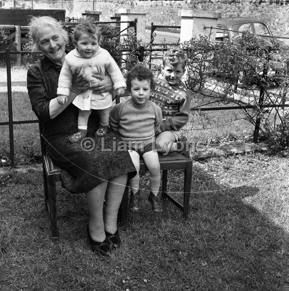 Mrs Giblin & her grandchildren, 1965