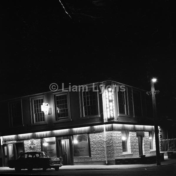 Night shot of the West Bar, 1966