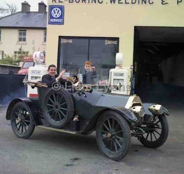 Michael Duffy with vintage car & his son