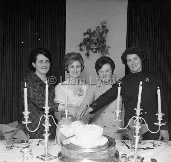 ICA Straide ladies cutting their Birthday cake