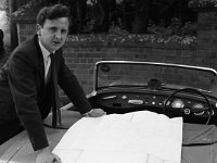 Brendan Heneghan with Housing Development plans for Castlebar, June 1964 - Lyons0000240.jpg  Brendan Heneghan with Housing Development plans for Castlebar, June 1964 : Brendan, Development, Heneghan, Housing, plans