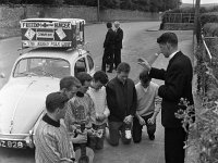 Fr Paddy Lyons blessing Westport men 1965 - Lyons0000315.jpg  Fr Paddy Lyons blessing Westport men as they embark on their fundraising campaign, 1965 : blessing, Collection, embark, fundraising, Paddy, Westport