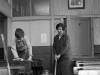 Housed travellers - Lyons0001066.jpg  Settled traveller & her son helping with the tidying in the local school. Original folder, 1968 Misc : Travellers