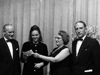 Irwin's Fashion Show in the Travellers Friend Hote - Lyons0001102.jpg  Irwin's Fashion Show in the Travellers Friend Hotel. Paddy Irwin, model, Ms Irwin & John Irwin. Original folder, 1968 Misc : Fashion show, John Irwin., Paddy Irwin, Traveller's Friend Hotel