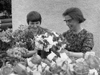 Mrs Gibsey right tending her flowers - Lyons0001165.jpg  Mrs Gibsey right tending her flowers. Article for Womans Way. Original folder, 1968 Misc
