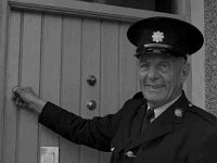 Garda Roache retirement - Lyons0001246.jpg  Retiring Garda Roache locking up Murrisk Garda station for the last time : Murrisk Garda Station