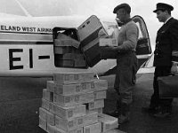 Yeast for O' Connors Bakery delivered by Ireland West Airways. - Lyons0001278.jpg  Yeast for O' Connors Bakery delivered by Ireland West Airways. At right Captain Robin Black (IWA) & Pat Neary Castlebar Airport helping to unload the plane. : Castlebar Airport, Pat Neary, Robin Black