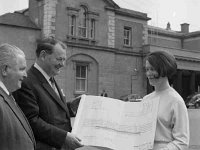 Mr O' Morain looking at plans for Castleba - Lyons0001325.jpg  Plans for Castlebar in relation to the decentralisation of the Department of Agriculture Breaffy Road, Castlebar. At left Cllr Willie Cresham. Photo taken infront of the Courthouse in Castlebar. : Micheal O'Morain, Willie Cresham