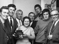 Singing pubs Mickie Moran's pub Castlebar - Lyons0001374.jpg  Second from the left Brendan Quinn Harp Larger Rep. Mickie Moran (Proprietor) left of guitar player. (Now Rocky's pub in Castlebar). : Castlebar, Moran's pub