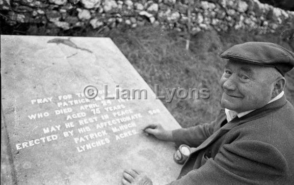 Stone Mason cleaning the headstone on the grave of Mrs Nixon's a  Stone Mason cleaning the headstone on the grave of Mrs Nixon's antecedent