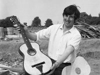 Tom in the McKeever Estate showing the guitar he made - Lyons0001688.jpg  Tom in the McKeever Estate showing the guitar he made