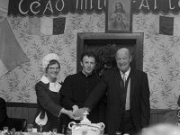 Fr Michael Neary with his parents,cutting the ordination cake. - Lyons0002114.jpg  Fr Michael Neary with his parents,cutting the ordination cake. : Michael Neary, Ordination