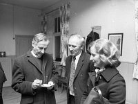 Dr Simms Primate at Convent of Mercy Westport - Book of Kells l  Dr Simms Primate at Convent of Mercy Westport - Book of Kells lecture - Lyons0002946.jpg  Dr Simms Primate at Convent of Mercy Westport - Book of Kells lecture. Archbishop Dr Simms signing autograph for J P and Frances Campbell, Westport. : Convent of Mercy Westport, Simms