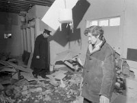 Explosion in Claremorris Town Hall. - Lyons0002949.jpg  Explosion in Claremorris Town Hall. Proprietor of rival dance-hall subsequently convicted. Tom Higgins, Claremorris and a guard examining the damage. : Claremorris, Explosion