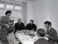 Stations in Tom Flaherty's Islandeady - Lyons0003233.jpg  Stations in Tom Flaherty's Islandeady. Mrs Flaherty pouring the tea for Fr S Blowick PP,Islandeady and Fr Grealy CC, Islandeady. Sitting at right Tom Flaherty and the two Flaherty children. : Flaherty, Islandeady