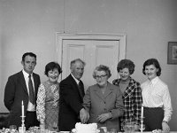 Mr & Mrs Moran 40 years married - Lyons0003421.jpg  Mr and Mrs Moran with their son and daughters cutting the cake. : Moran