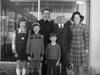 Fr Willie Spicer - First mass - Lyons0003439.jpg  Fr Willie Spicer with his uncle Jim and Mrs Ann O'Toole and their children. : O'Toole, Spicer