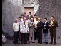 Presentation by the Gibbons' brothers to the Handball Club - Lyons0003583.jpg  Presentation by the Gibbons' brothers to the Handball Club.  L-R : Front row Eamon Connolly, All-Ireland Handball Champion from Newport, Chris Gibbons publician, High St and his brother Dr Gibbons presenting the cup to Jim Dyar, Bridge St, Nickie Lambert and Mickie Heraty, Westport.  Middle row : Joe Mc Nally, Vincent Conlon and Noel Burke, Westport.  Back row : John Joe Geraty, Newport; Joe Joe Moran, Westport Quay and Paddy Gallagher, Westport. Presentation by the Gibbons' brothers to the Handball Club.  L-R : Front row Eamon Connolly, All-Ireland Handball Champion from Newport, Chris Gibbons publician, High St and his brother Dr Gibbons presenting the cup to Jim Dyar, Bridge St, Nickie Lambert and Mickie Heraty, Westport. Middle row : Joe Mc Nally, Vincent Conlon and Noel Burke, Westport. Back row : John Joe Geraty, Newport; Joe Joe Moran, Westport Quay and Paddy Gallagher, Westport. : Burke, Conlon, Connolly, Dyar, gibbons, Handball, Heraty, Lambert, McNally