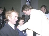Fr Tom Brady's Ordination - Lyons0004868.jpg  Fr Tom blessing his parents during ordination. : Brady, Killawalla, Ordination
