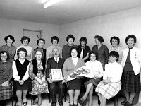 Presentation to retiring postman - Lyons0005088.jpg  Glenhest community presentation to retiring postman. Ladies of the Glenhest ICA making a presentation to the retiring postman and his wife. : Glenhest, Postman