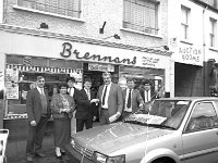 Presentation of car - Lyons0005209.jpg  Christy Loftus, Ballinacorrick winner of the nissan sunny car in the NTL draw receiving the keys sold by P Brennan, Ballina. At left Paddy Brennan and his wife Newsagents, Ballina sellers of the winning ticket. : Brennan, Loftus