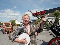 Fonsie Munroe, Ballinrobe, June 1995 - Lyons0012294.jpg  Fonsie Munroe proprietor of the new Texaco station, the Neale rd, Ballinrobe happily playing his banjo and showing a collection of his antiques, June 1995 : Ballinrobe, Munroe