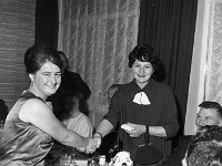 Post Office Dinner, 1965. - Lyons0005979.jpg  Mary Berry Westport making a presentation to Guest of Honour's wife.  Post Office Dinner, 1965. : 19650901 Post Office Dinner 3.tif, Functions 1965, Lyons collection