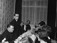 PTAA Westport in Clew Bay,1966. - Lyons0006141.jpg  Fr Michael Toibin &  Fr Michael Golden speaking at the dinner. PTAA Westport in Clew Bay,1966. : 19661219 PTAA Westport in Clew Bay 2 .tif, Functions 1966, Lyons collection