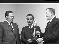 Reception for Manchester Anglers, 1967. - Lyons0006172.jpg  Reception for Manchester Anglers, 1967.  Mr Paddy Jennings presents Jennings Angling Trophy to Mr A Grant (Blackpool). On right Mr Harry Holden (Guiness Rep) : 196705 Reception for Manchester Anglers 1.tif, Functions 1967, Lyons collection