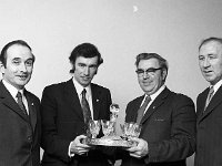 Presentation Dinner to Joe Gavin Town Clerk, 1973. - Lyons0007536.jpg  L-R : Mr Donal Warde, Mayo County Manager; Mr Joe Gavin, retiring town clerk who later became Cork County and City Manager; John James Flynn, Chairman of Westport UDC and JP Campbell Vice Chairman. Presentation Dinner to Joe Gavin Town Clerk, 1973. : 19730126 Presentation Dinner to Joe Gavin Town Clerk 3.tif, Functions 1973, Lyons collection