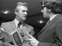 Connaught Telegraph Staff Dinner, 1973. - Lyons0007635.jpg  Liam Nolan from RTE discussing GAA Year Book with Tom Courell, Connaught Telegraph. Connaught Telegraph Staff Dinner, 1973. : 19730309 Connaught Telegraph Staff Dinner 6.tif, Functions 1973, In the Travellers Friend, Lyons collection