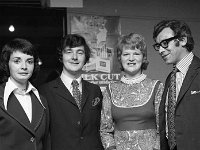 CasGallagher Silk Cut Finals in Quinns Glenamaddy, 1973. - Lyons0007661.jpg  Gallagher Silk Cut Finals in Quinns Glenamaddy, 1973. Bridget Donohoe and her husband Seamus, winners of the Silk Cut Sing to Success in Quinn's bar, Glenamaddy. At extreme left and at right of picture Gallaghers' personnel. : 19730918 Gallagher Silk Cut Finals in Quinns Glenamaddy 1.tif, Functions 1973, Lyons collection